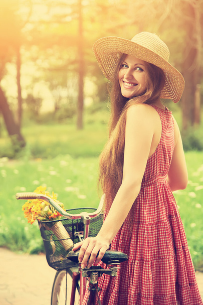 Young woman and bike - Photo, Image