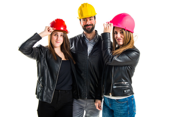 Persone di lavoro con cappelli colorati
 - Foto, immagini