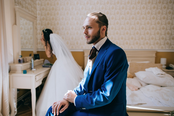 bride and groom portrait in bedroom - Valokuva, kuva