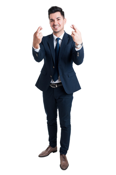 Salesman or businessman making good luck gesture - Photo, Image