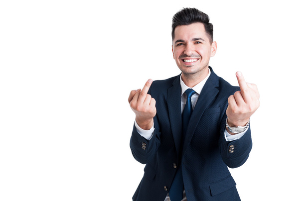 Smiling businessman showing double middle finger - Photo, Image