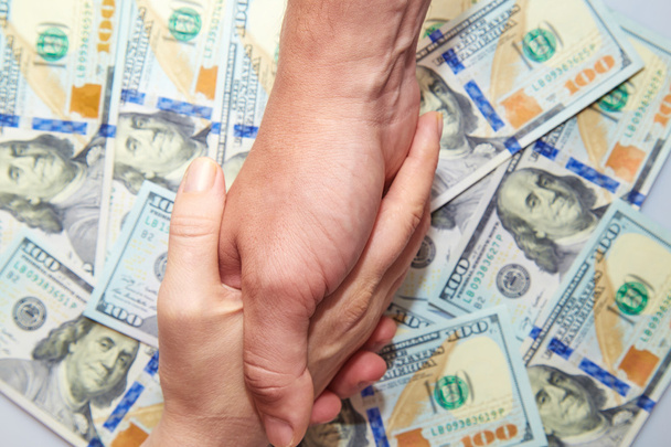 handshake against dollar notes - Foto, immagini