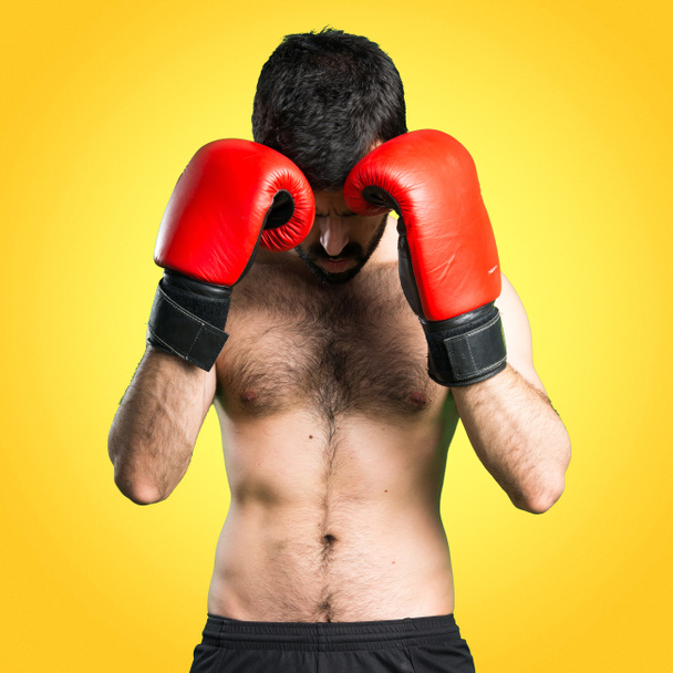 Sportman with boxing gloves - Photo, Image