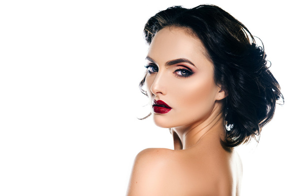 Elegant woman model with makeup and hair on a white background - Zdjęcie, obraz