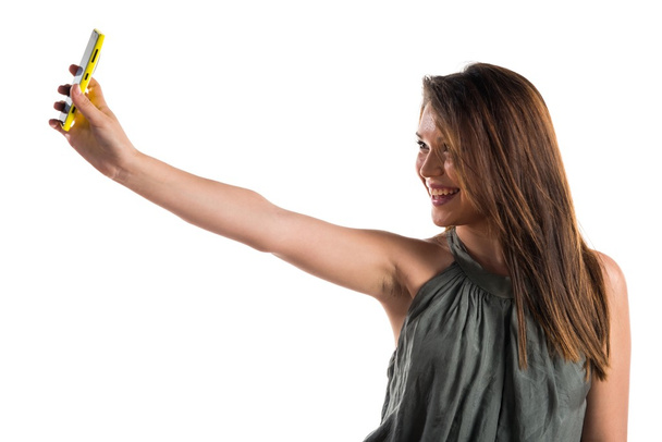 Young girl making a selfie - Foto, immagini