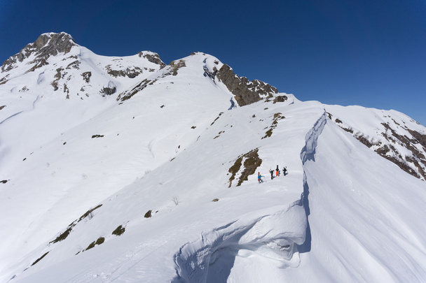 Snowboarders walking uphill for freeride, extreme sport - Фото, зображення