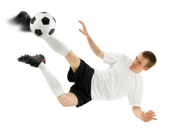 Accomplished soccer player in midair - Foto, imagen