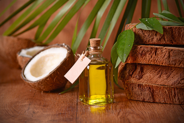 coconut oil in the bottle - Φωτογραφία, εικόνα