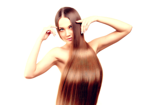 Long hair. Hairstyle. Hair Salon. Fashion model with shiny hair. - Foto, Imagen