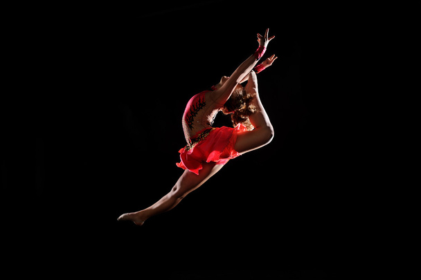 young girl doing gymnastics - Fotó, kép