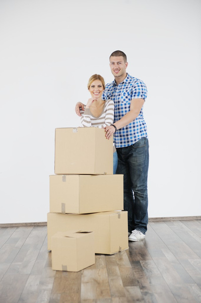 Young couple moving in new home - Photo, Image