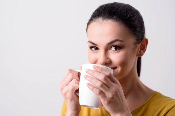 Positive girl drinking tea - Foto, Imagem