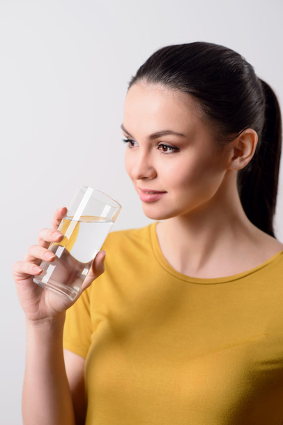 Nice girl drinking water - Foto, Imagem