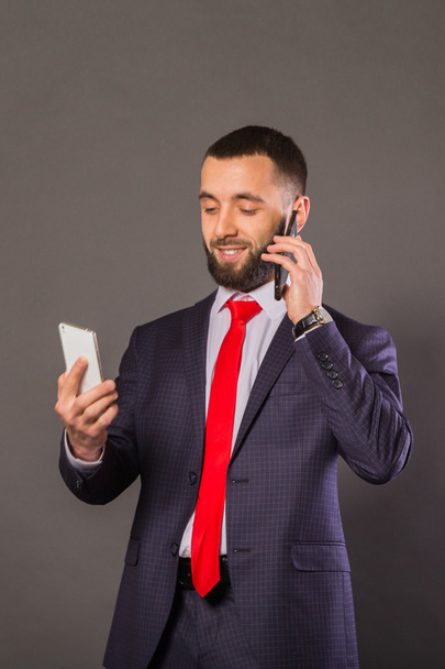 Young successful man with a mobile phone - Photo, Image