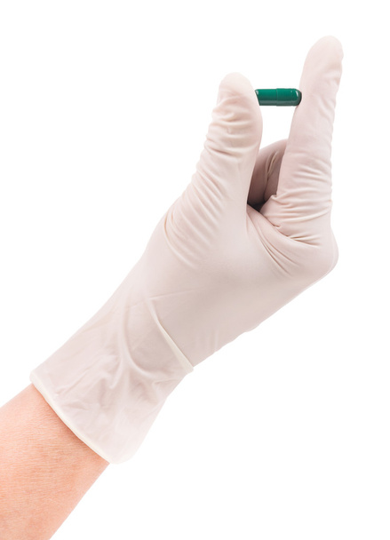 Pill in doctor's hand - Foto, afbeelding