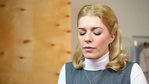 Sad blond businesswoman taking pills for headache at workplace. Healthcare - Кадры, видео