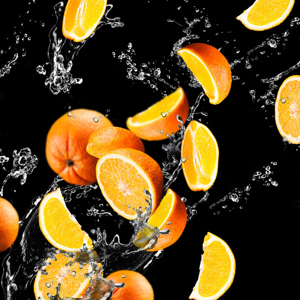 Turuncu meyve ve su sıçramasına - Fotoğraf, Görsel