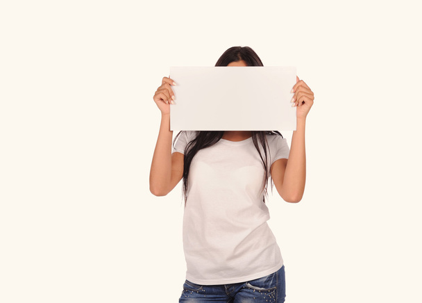 Beautiful girl holding a blank billboard - Фото, зображення