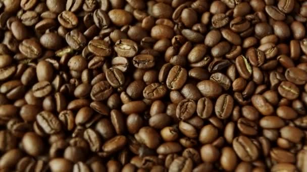 Rotation of aromatic roasted coffee beans - Video, Çekim