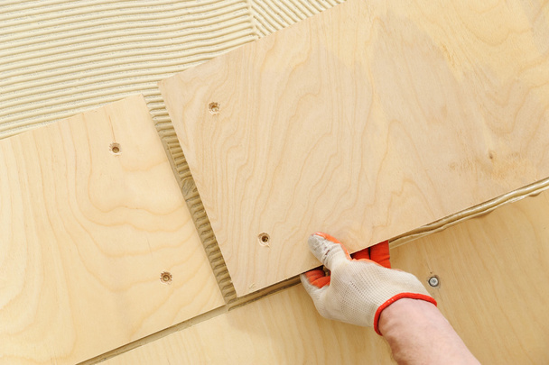Laying plywood on the floor. - Photo, Image