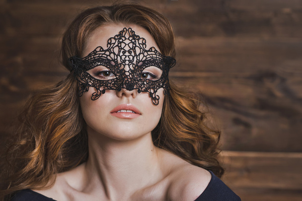 Portrait of a girl in a black masquerade mask 5968. - Φωτογραφία, εικόνα