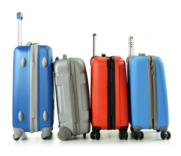 Багаж, що складається з валіз, ізольованих на білому
 - Фото, зображення