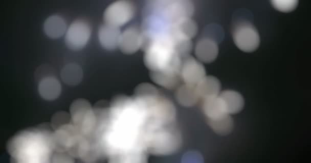 Wazig fairy lichten uit fireworks achtergrond. - Video