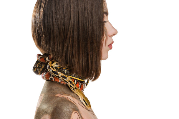 Girl with bodyart make-up and with snakes in the image of Gorgon - 写真・画像