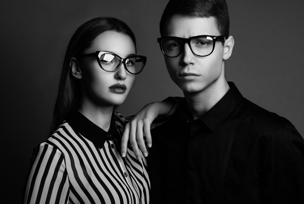 Fashion models couple wearing sunglasses. Sexy woman and handsom - Photo, image