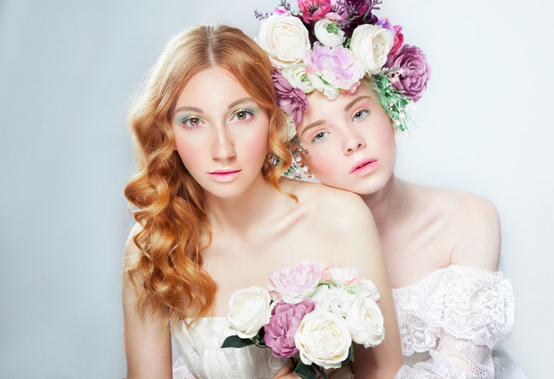 woman beauty concept. High fashion portrait Two young beautiful  - Фото, изображение