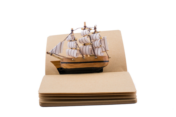 Ship on a notebook - Фото, изображение