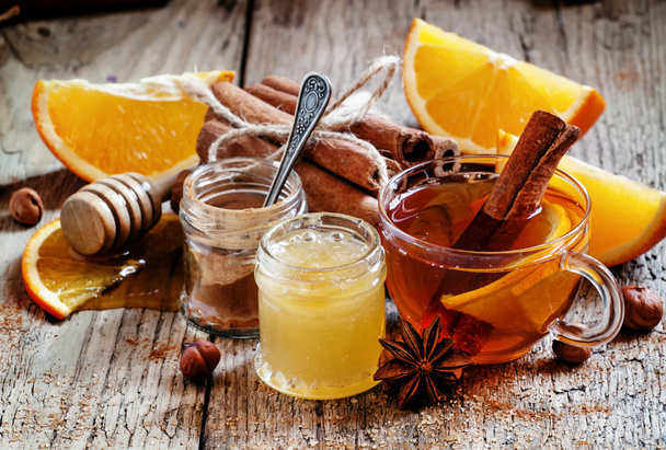 Warming black tea with honey, cinnamon and orange - Photo, Image