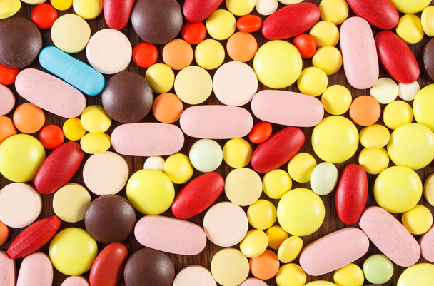 Colorful medical pills and capsules as background, health care concept - Fotografie, Obrázek