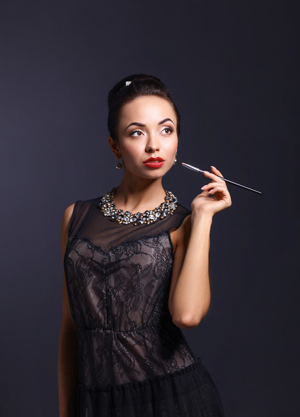 Portrait of young beautiful woman with jewelry - Foto, Bild