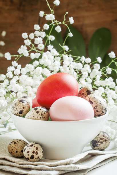 Pink easter eggs in white bowl - Photo, image