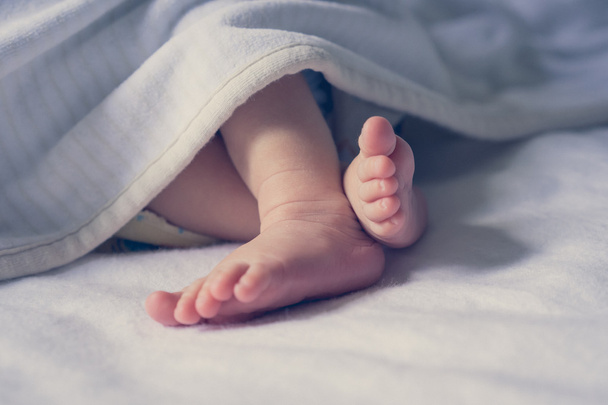 newborn feet close up. - Zdjęcie, obraz