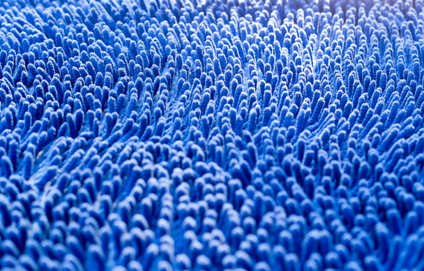 Kijelölt fókusz kék szőnyeg takarítás textúra  - Fotó, kép