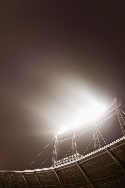 Вид на вогні стадіону вночі
 - Фото, зображення