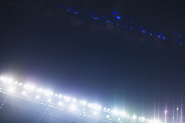 Вид на огни стадиона ночью
 - Фото, изображение