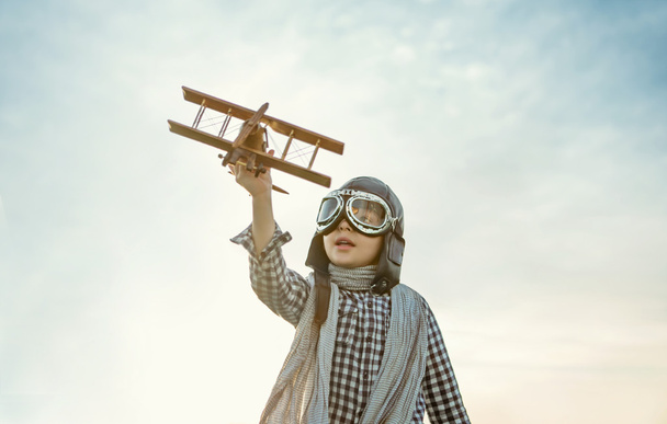 Little boy with airplane - Photo, Image