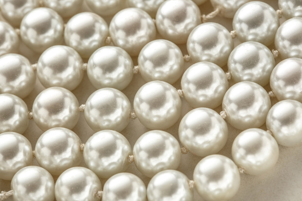 Corde de perles blanches
 - Photo, image