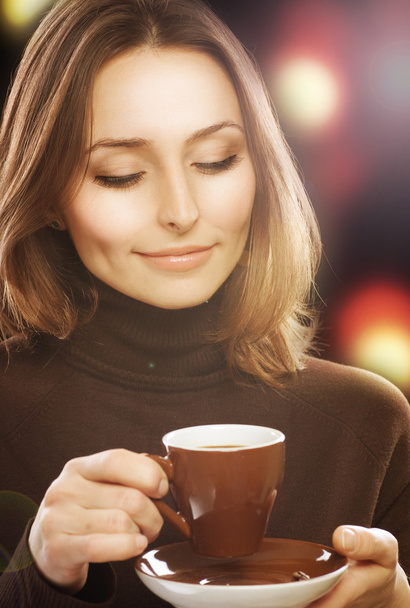 Beautiful Young Woman drinking Coffee - Photo, Image