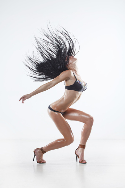 Dancing model with sport body - Foto, afbeelding