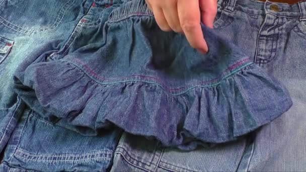 Used blue jeans and skirts for sale. Second hand  - Footage, Video