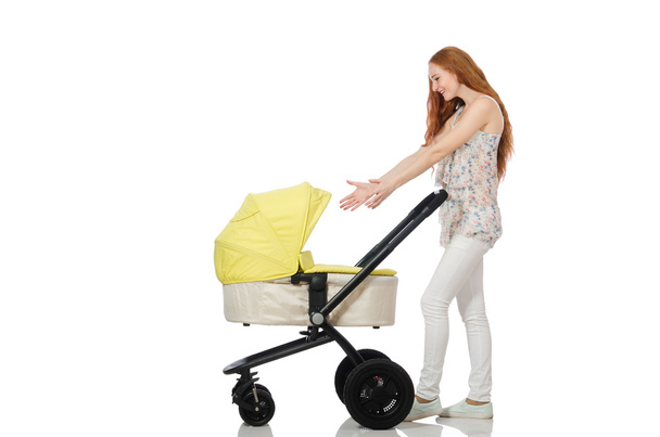 Женщина с ребенком и коляской изолированы на белом - Фото, изображение