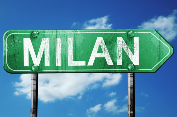 Milan road sign, vintage green with clouds background - Foto, Bild
