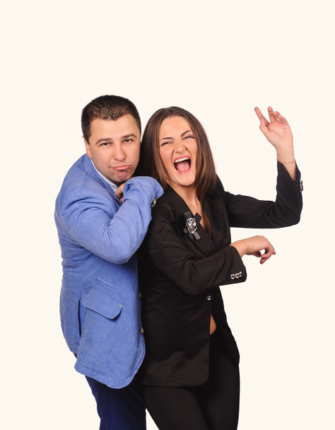 Man and woman with funny faces isolated over white background - 写真・画像