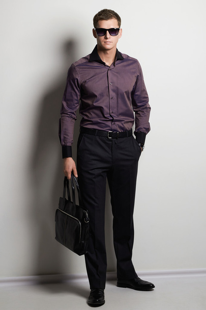 fashionable man with handbag - Foto, Imagem