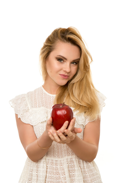 young beautiful girl with Apple in hands isolated on white background - Фото, зображення