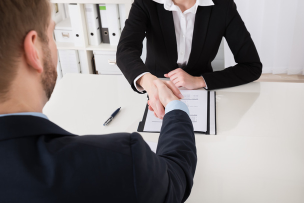 Businesswoman Shaking Hands With Man - Photo, image